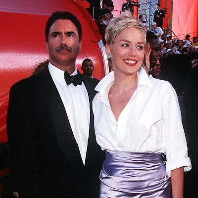 Sharon Stone and Phil Bronstein were photographed at an event in the 90s.
